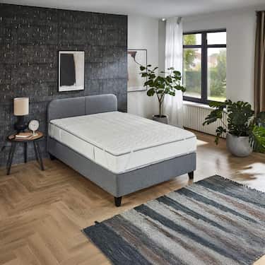 2,5 cm Komfortschaumtopper Sleezzz® Basic 160 x 200 cm mit 7-Zonen-Wellensteppung und Eckgummis